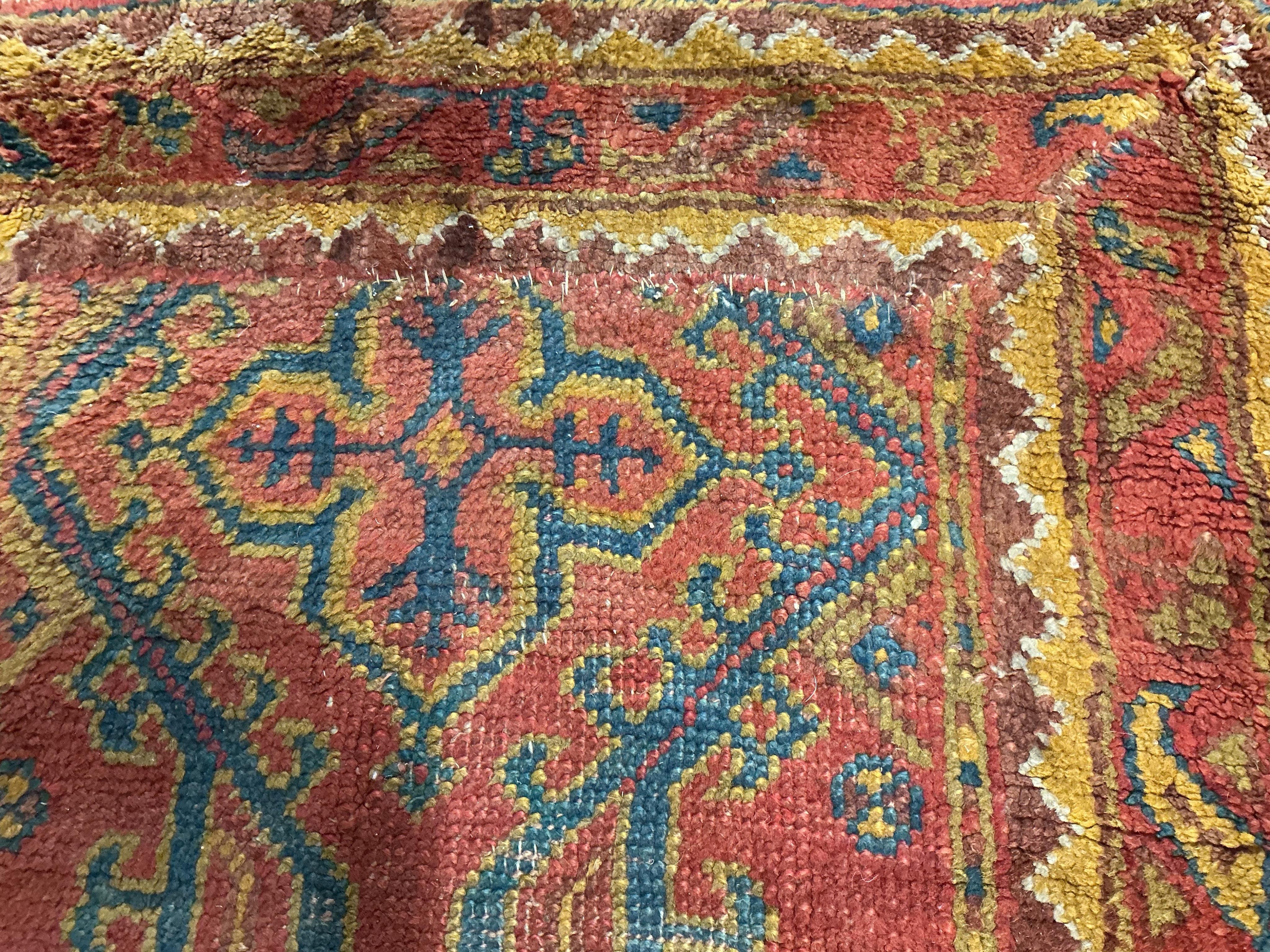 A Turkish Ousak runner, 396 x 96cm